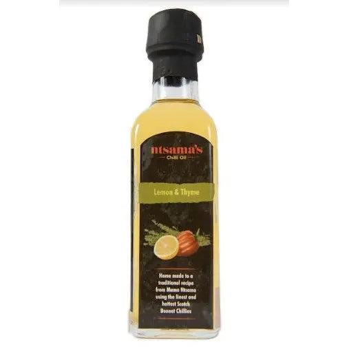 Lemon and thyme essential oil bottle from ntsama.co.uk with fresh lemon slices and sprigs of thyme around it.