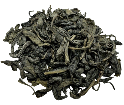 Porter Hill Tea Company Lucky Dragon Hyson green tea leaves in a clear container, showcasing the light green, rolled tea leaves.