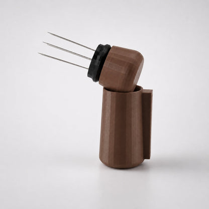 KNOCDIC® magnetic WDT tool with brown handle for detecting cracks in glazed pottery or porcelain.