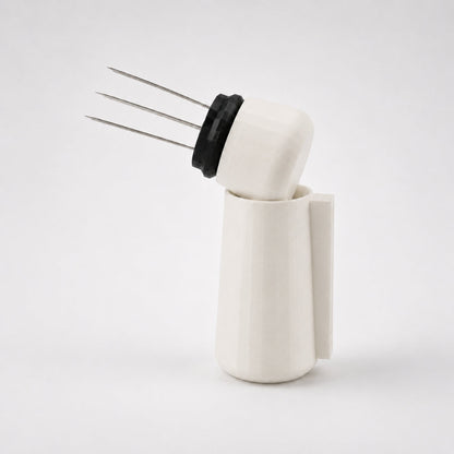 KNOCDIC® WDT tool with magnetic holder, off-white color, used for precise station keeping in electronic component testing.