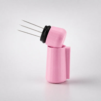 KNOCDIC® magnetic WDT tool in pink with magnetic holder, used for precise watchmaker or jewelry repair.