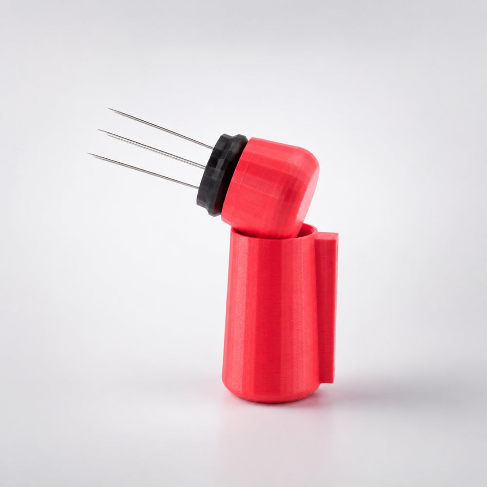 Red WDT tool with magnetic holder by KNOCDIC® for precise tea-needle adjustments in espresso machines.