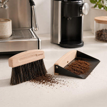 KNOCDIC® Magnetic Dustpan and Horsehair Brush set for cleaning, shown in a lifestyle setting with cleaning tools on a table.