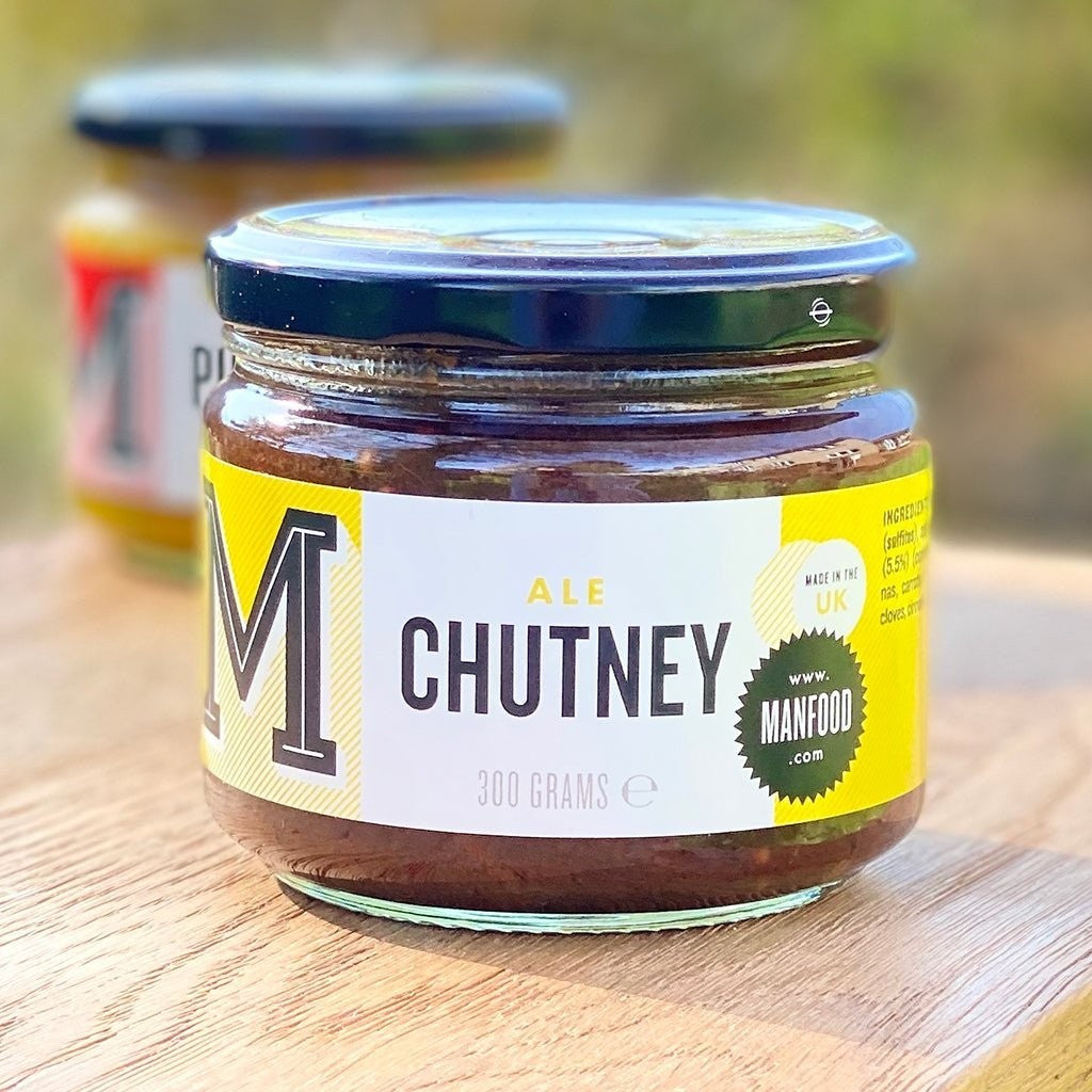 Jar of Manfood Traditional Ale Chutney showing a label with a dark, rich chutney inside a glass jar.