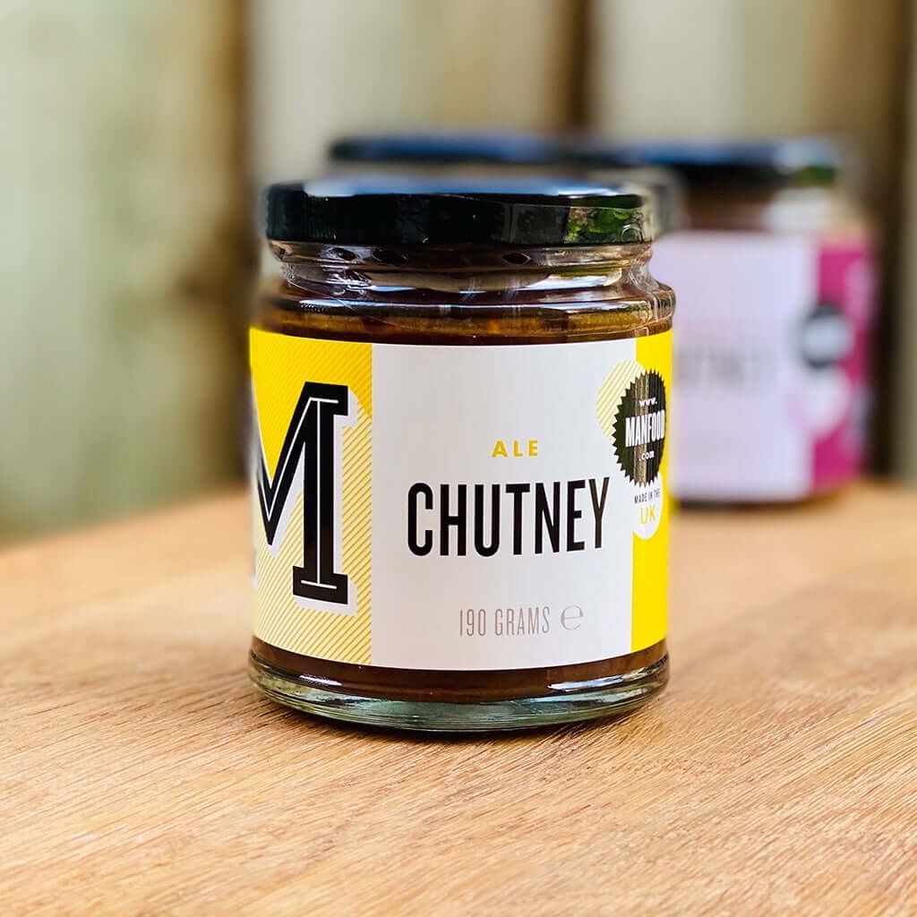 Jar of Manfood Traditional Ale Chutney with a dark, rich texture and label featuring the Manfood brand logo and product name.