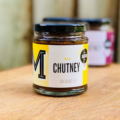 Jar of Manfood Traditional Ale Chutney with a dark, rich texture and label featuring the Manfood brand logo and product name.