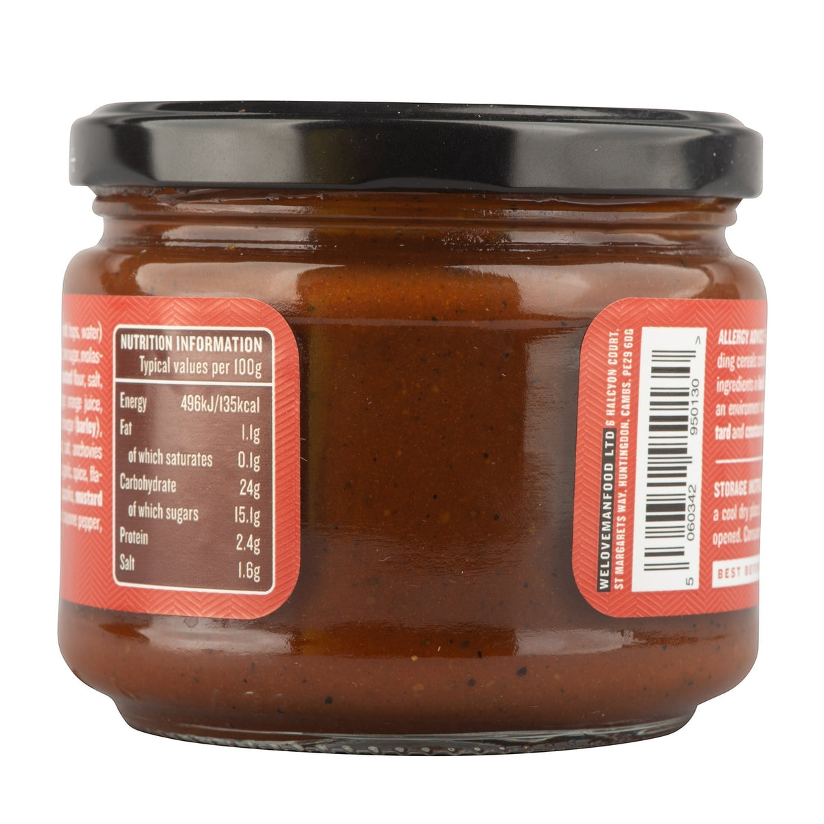 Manfood Beer Barbecue Sauce bottle with label featuring bold text and images of grilled meats on a wooden surface.