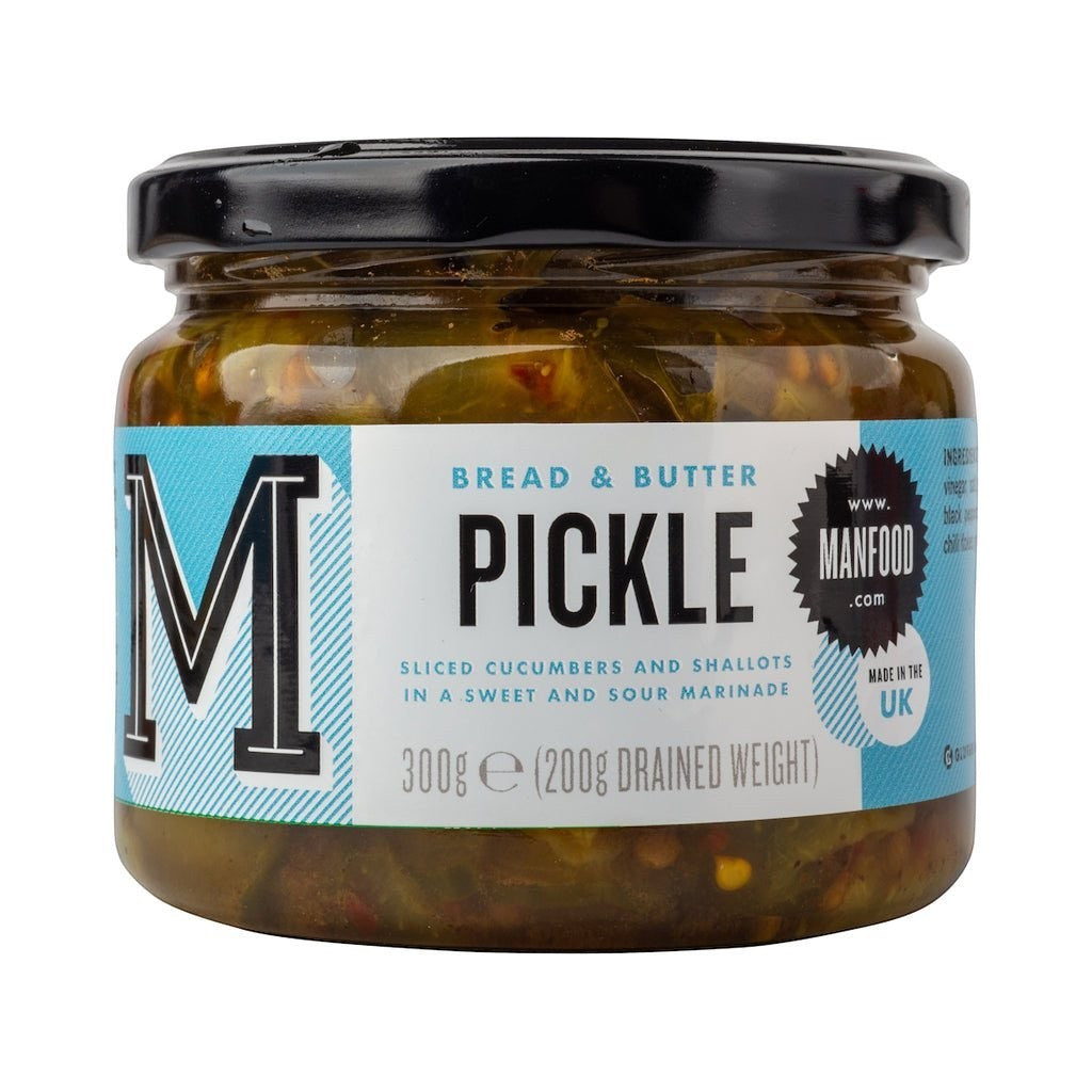 Jar of Manfood bread and butter pickles with sliced pickles visible inside, showcasing their golden color and texture.
