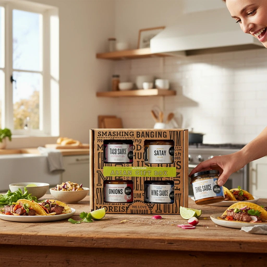 Manfood Asian-inspired sauce gift box collection featuring a variety of flavorful sauces in a decorative gift box.