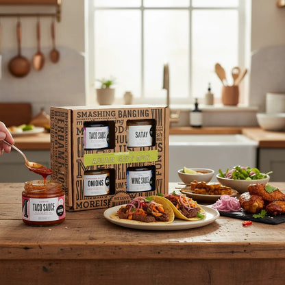Manfood Asian Inspired Sauce Gift Box featuring various bottles with colorful labels, perfect for gift-giving or cooking.