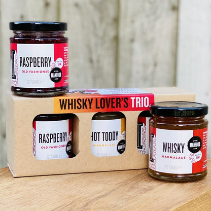 Manfood Whisky Lover's Trio Marmalade Gift Set in a decorative gift box with three jars of marmalade, perfect for whisky enthusiasts.