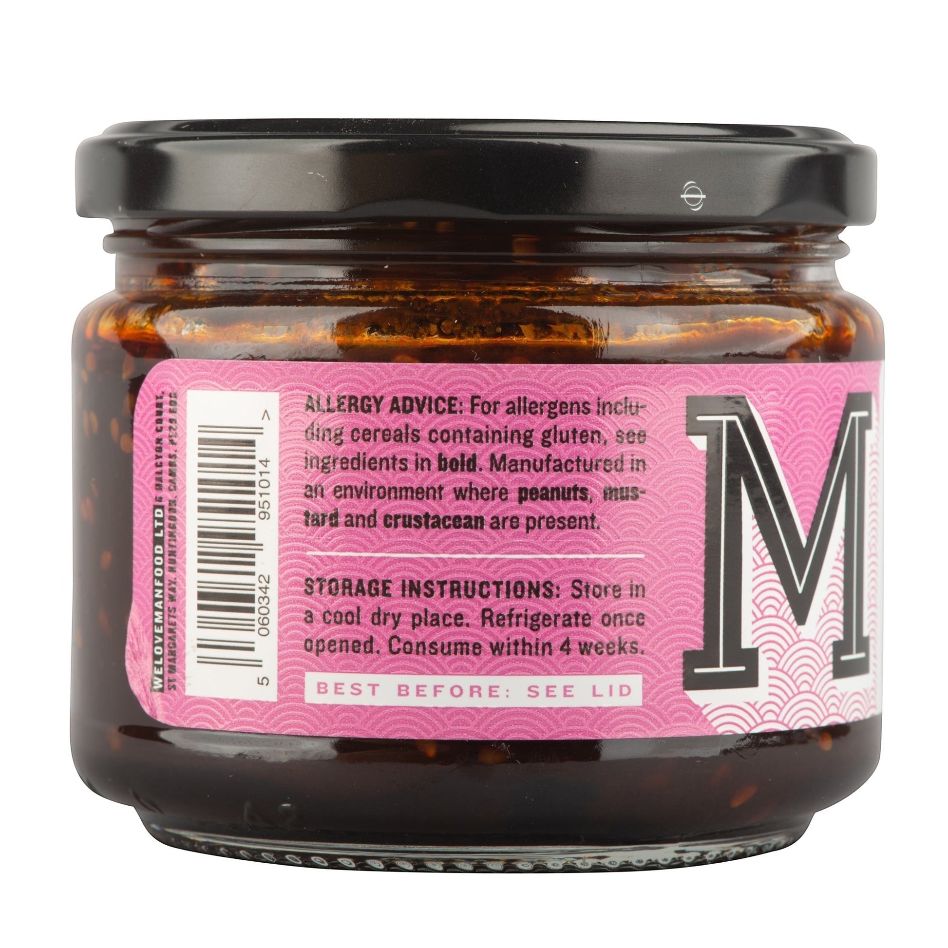 Manfood Korean Taco Sauce jar showing the pink label with allergy and storage information on a white background