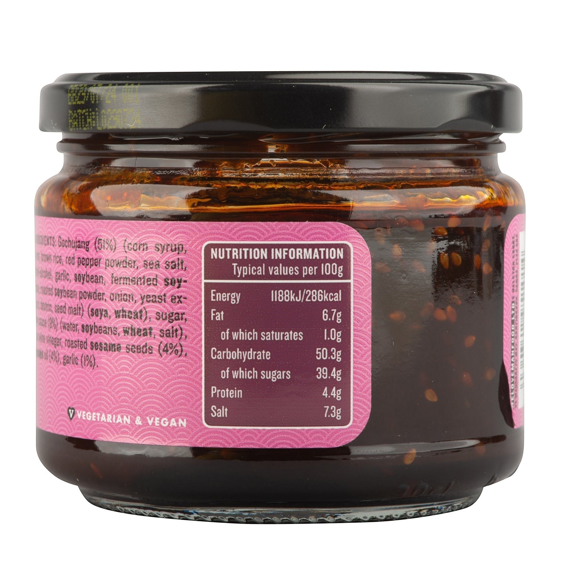 Manfood Korean Taco Sauce jar showing nutrition information label and ingredients list on a pink background