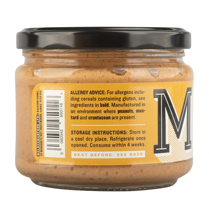 Manfood Peanut Satay Sauce in a glass jar with a yellow label showing allergy and storage information