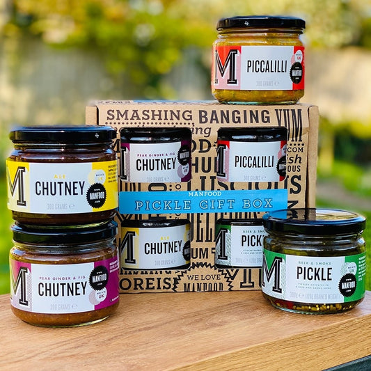 Manfood pickle gift box selection featuring assorted artisanal pickles in a stylish gift box for food lovers.