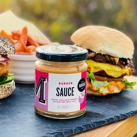 Creamy Manfood Vegan Burger Sauce in a jar, with a smooth texture and rich flavor, ideal for enhancing vegan burger dishes.
