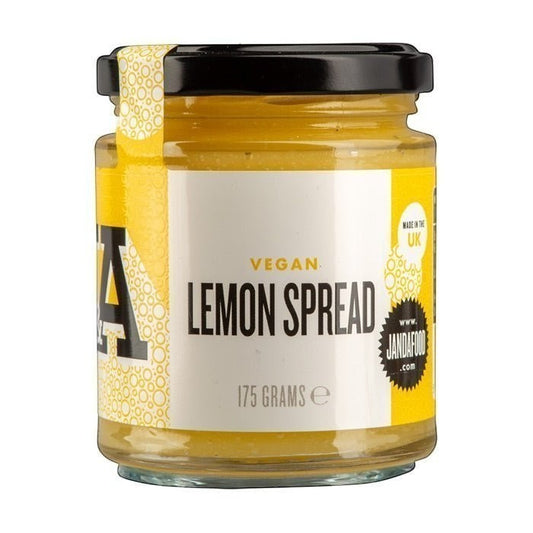 Vegan Lemon Curd spread by Manfood, showcasing a jar of vibrant, handcrafted lemon spread with fresh lemons in the background.
