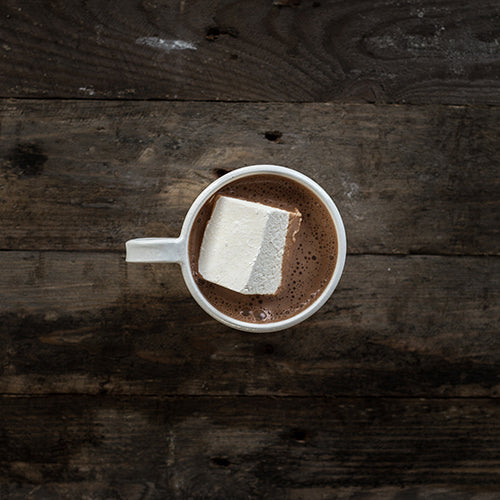 Creamy hot chocolate with marshmallows in a mug, featuring Harry's Hot Chocolate Chilli Hot Chocolate flavor.