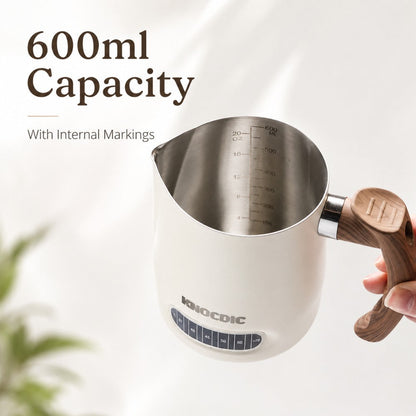 KNOCDIC® 600ml milk frothing pitcher with built-in thermometer for precise steaming and frothing of milk.