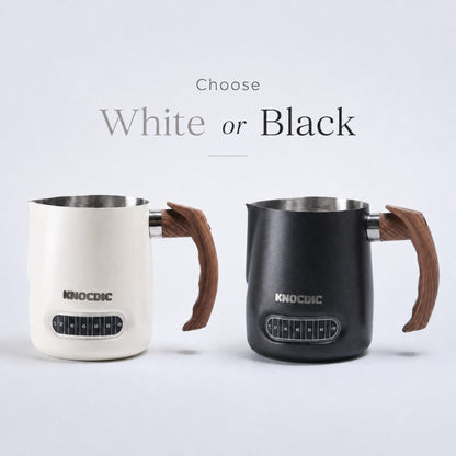 KNOCDIC® milk frothing pitcher with built-in thermometer in various colors for steaming and frothing milk.