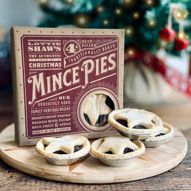 Lottie Shaw's Seriously Good Mince Pies in 245g pack with golden pastry and rich fruit filling on a plate.