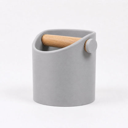 KNOCDIC® minimalist coffee knock box with ash grey finish and real oak wood bar for espresso grounds disposal.