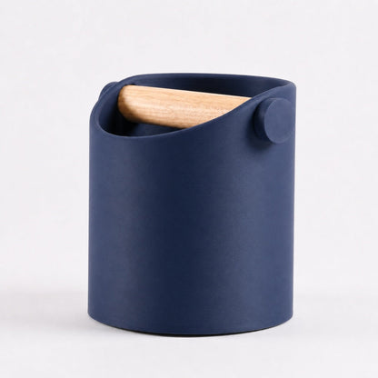 Dark blue minimalist coffee knock box with a real oak wood bar by KNOCDIC®, designed for espresso machine use.