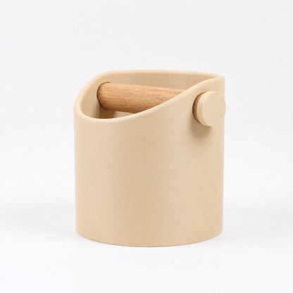 Minimalist coffee knock box with desert tan finish and real oak wood bar by KNOCDIC® for espresso preparation.