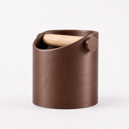 Minimalist coffee knock box with galaxy brown finish and real oak wood bar, designed by KNOCDIC® for espresso machine use