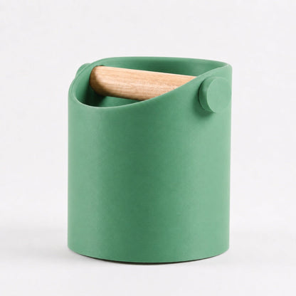KNOCDIC® minimalist coffee knock box with grass green finish and real oak wood bar for espresso puck disposal.