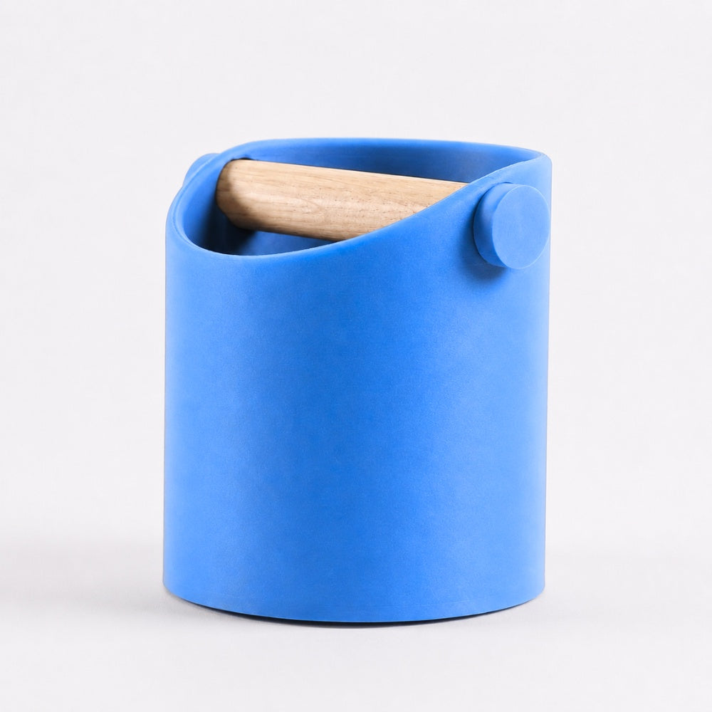 KNOCDIC® minimalist coffee knock box in marine blue with a real oak wood bar for espresso puck disposal.