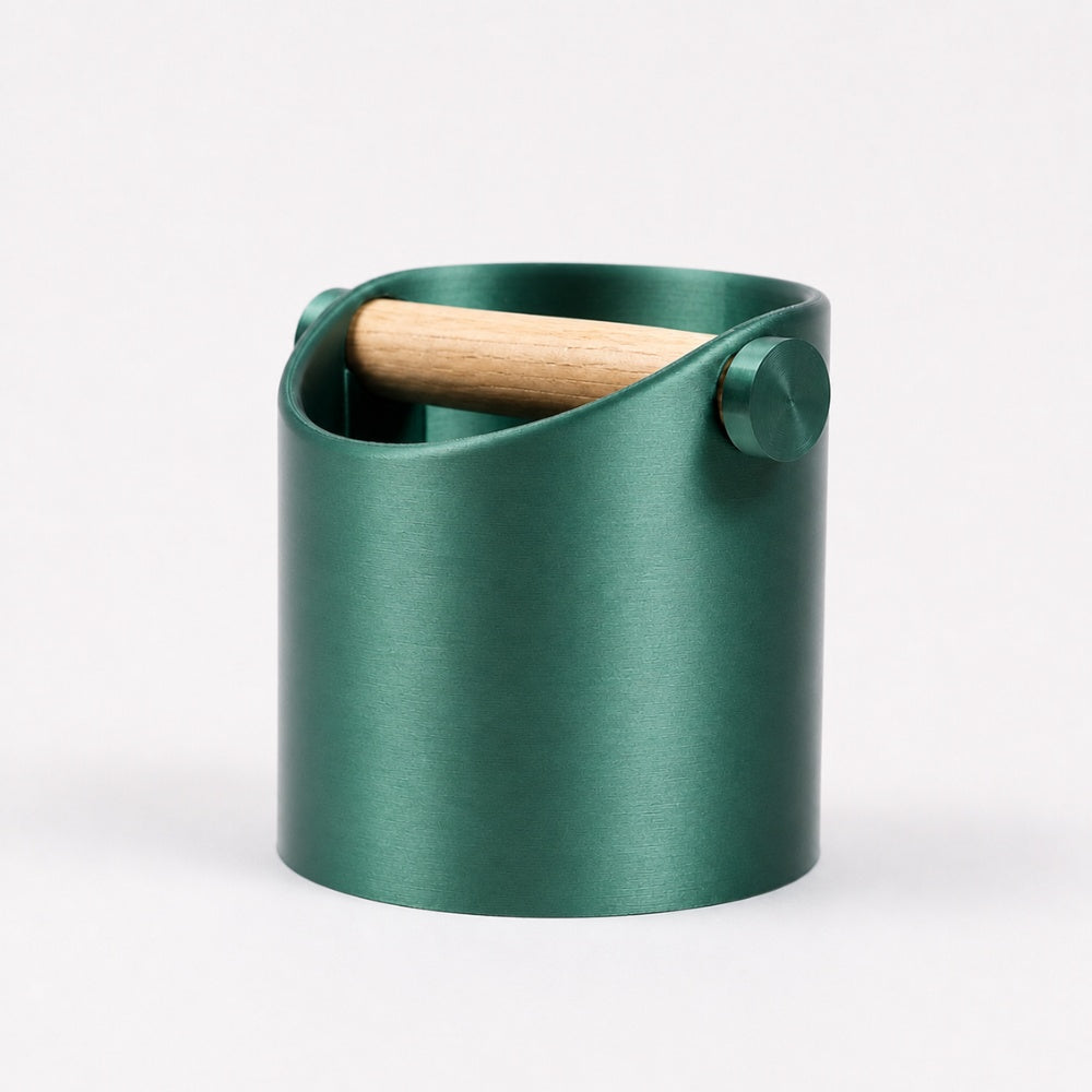 KNOCDIC® minimalist coffee knock box with metallic green finish and real oak wood bar for espresso grounds disposal.