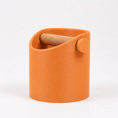 KNOCDIC® minimalist coffee knock box with real oak wood bar for espresso machine cleanup, in vibrant orange color.