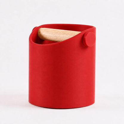 Red minimalist coffee knock box with real oak wood bar by KNOCDIC® for easy espresso puck disposal.