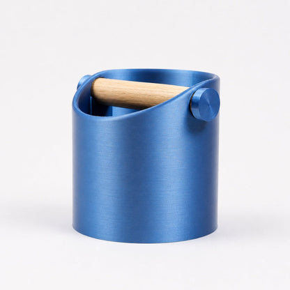 KNOCDIC® minimalist coffee knock box with metallic blue finish and real oak wood bar for espresso puck disposal.