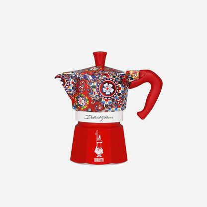Bialetti X Dolce&Gabbana Sicilian Cart gift set with 2-cup moka espresso pot, gold stirrers, and matching cups by Brew Italia.