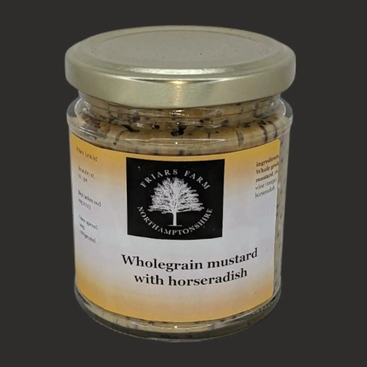 Jar of Friars Farm Whole Grain Mustard with Horseradish, showing the textured mustard with visible horseradish bits inside.