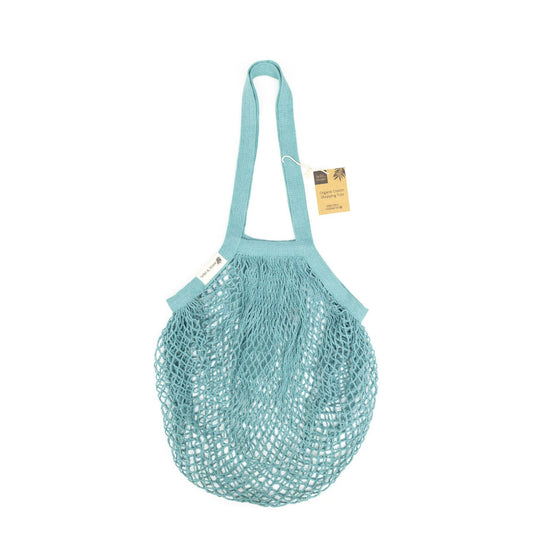 Organic cotton blue crochet tote bag by Wild And Stone, showing a spacious, handcrafted bag with sturdy handles and intricate crochet pattern.