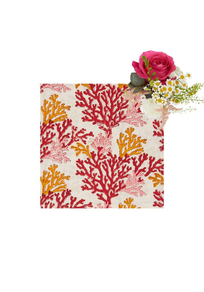 Set of four Casa by Josephine Jenno Rose Coral table napkins with elegant floral pattern for dining or decor.