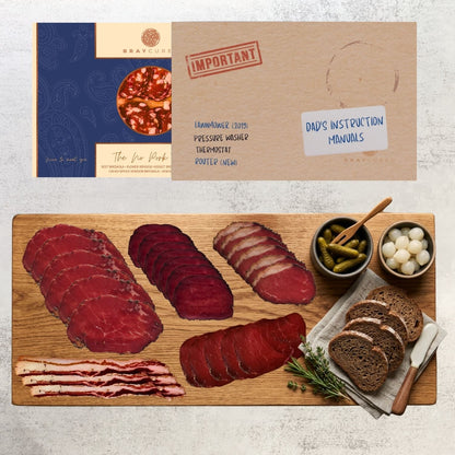 Bray Cured No Pork Feasting Five charcuterie selection on a wooden board with meats, cheeses, and accompaniments.