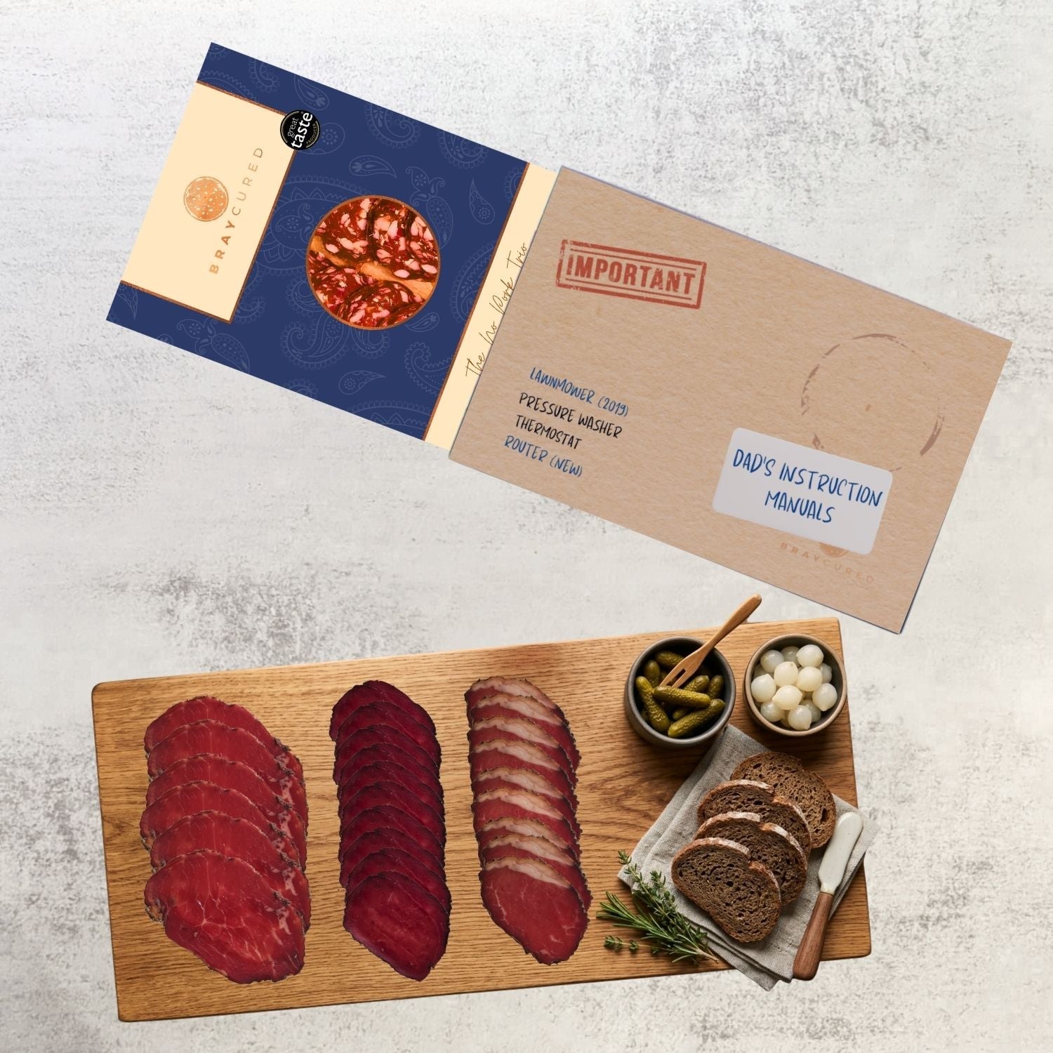 Bray Cured No Pork Tasting Trio charcuterie selection on a wooden board with a manual sleeve and tasting notes.