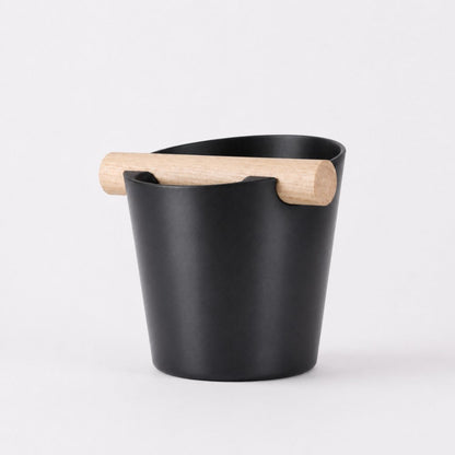Nordic Coffee Knock Box by KNOCDIC® with black metallic finish and real oak wood bar for espresso cleanup.