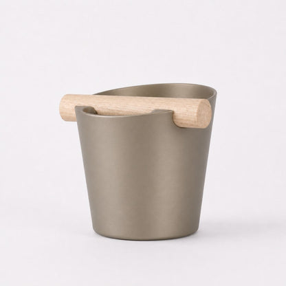 KNOCDIC® Nordic Coffee Knock Box with metallic gold finish and real oak wood bar for espresso shot cleanup.