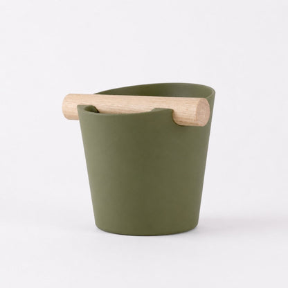 Nordic Coffee Knock Box with real oak wood bar in olive green, made by KNOCDIC®, for espresso machine use.
