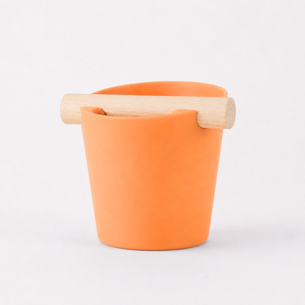 KNOCDIC® Nordic Coffee Knock Box with orange exterior and real oak wood bar for espresso puck disposal.