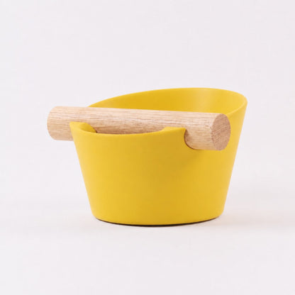 KNOCDIC® Nordic Coffee Knock Box with real oak wood bar, yellow color, used for knocking out espresso grounds in barista coffee making.