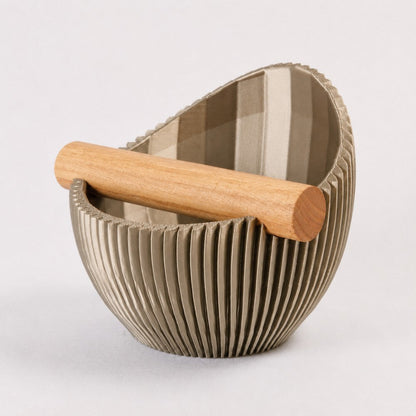 KNOCDIC Nova Coffee Knock Box with metallic gold finish and real oak wood bar, used for espresso puck disposal in coffee brewing.
