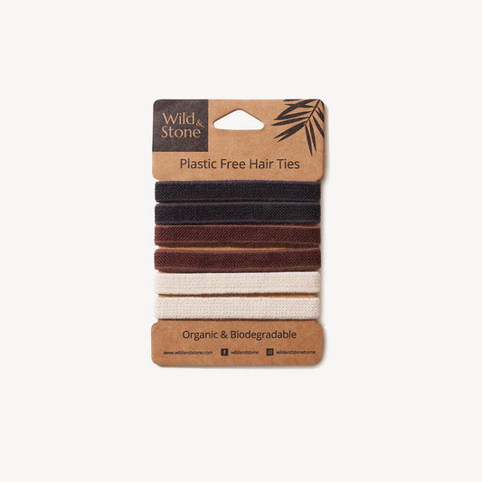 Six natural plastic-free hair ties from Wild and Stone in a pack, made of eco-friendly materials for gentle hair styling.