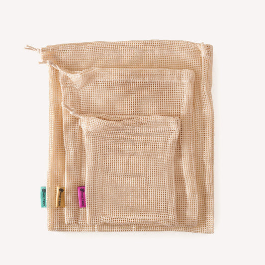 Reusable mesh produce bags made of organic cotton, 3-pack, by Wild And Stone for eco-friendly grocery shopping.