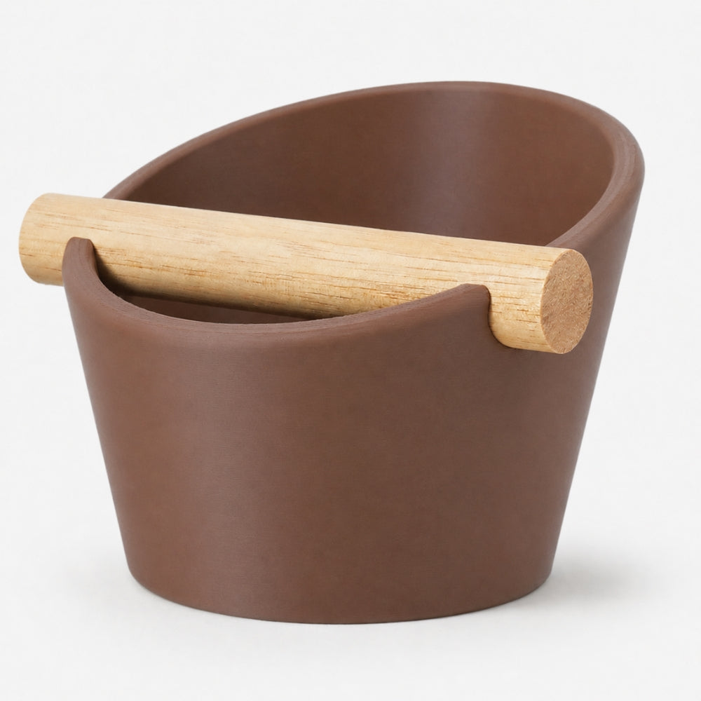 KNOCDIC® oval coffee knock box with brown finish and real oak wood bar for espresso machine cleaning.